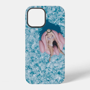Woman on pink buoy surrounded by body of water in iPhone 12 case