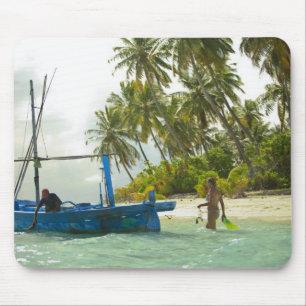 Woman on small traditional fishing boat, mouse mat