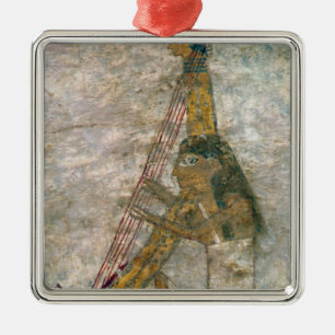 Woman playing an arched harp metal tree decoration