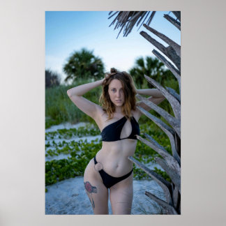 Woman Posing On The Beach In A Black Bikini Poster