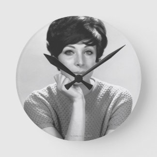 Woman Posing Round Clock