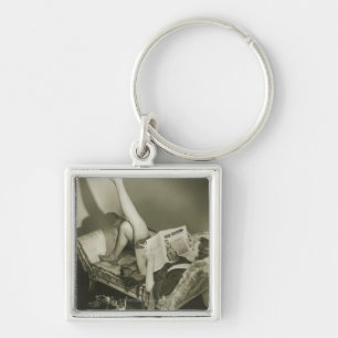 Woman Reading Magazine Key Ring