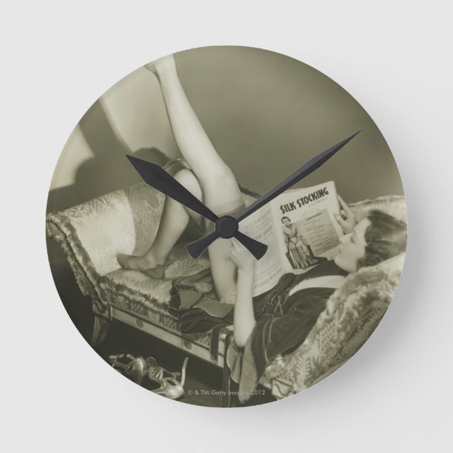 Woman Reading Magazine Round Clock (Front)