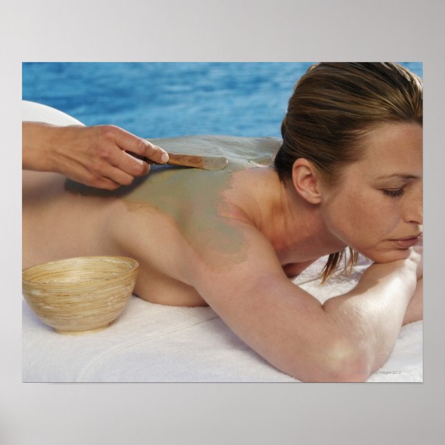 Woman receiving spa treatment, side view, close poster (Front)