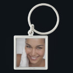 Woman scrubbing her face with cloth key ring<br><div class="desc">AssetID: 127825260 / {GretaMarie} / Woman scrubbing her face with cloth</div>