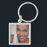 Woman scrubbing her face with cloth key ring<br><div class="desc">AssetID: 127825260 / {GretaMarie} / Woman scrubbing her face with cloth</div>