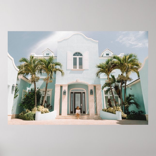 Woman sitting in front of building poster (Front)