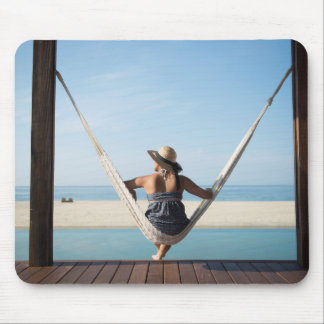 Woman Sitting On A Hammock At A Small Hotel Mouse Mat