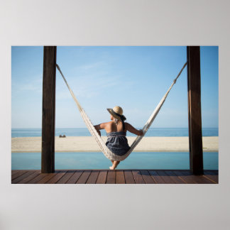 Woman Sitting On A Hammock At A Small Hotel Poster