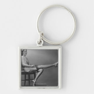 Woman Sitting on Chair Key Ring