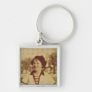 Woman Sitting Outside Key Ring
