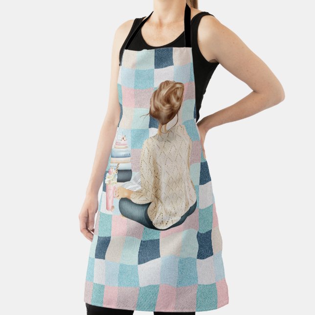 WOMAN SITTING WITH BOOKS AND HOT BEVERAGE APRON (Insitu)