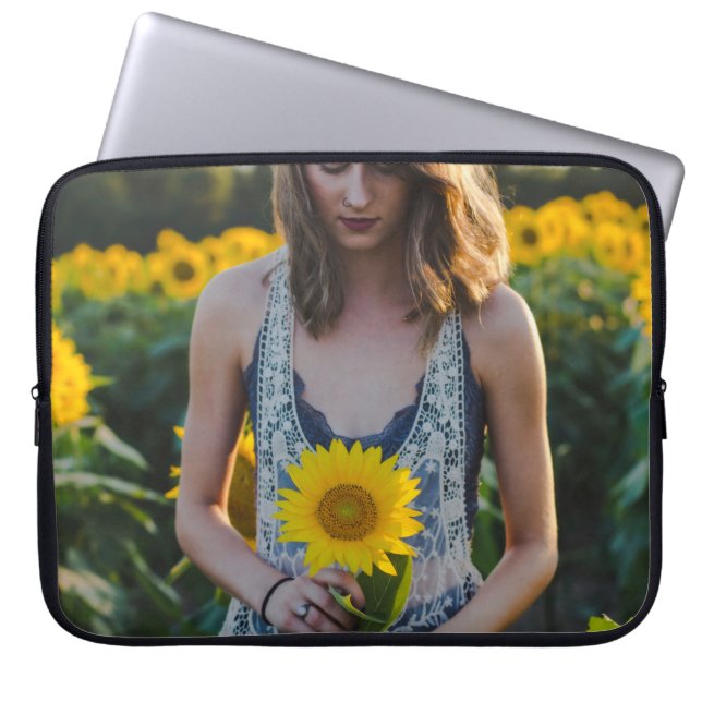 Woman standing at sunflower field laptop sleeve (Front)