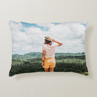 Woman standing near trees decorative cushion