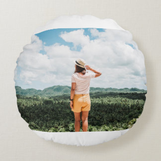 Woman standing near trees round cushion