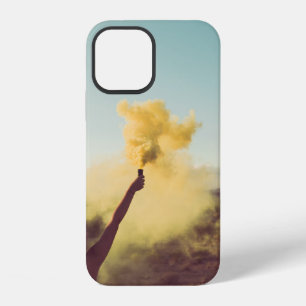 Woman standing on desert holding flare iPhone 12 case