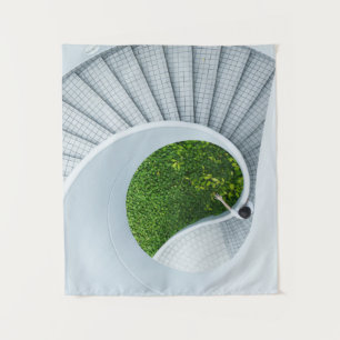Woman standing spiral stairs tapestry