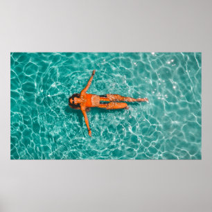 Woman swimming alone in body of water poster
