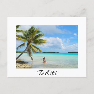 Woman under a palm in Tahiti white border postcard