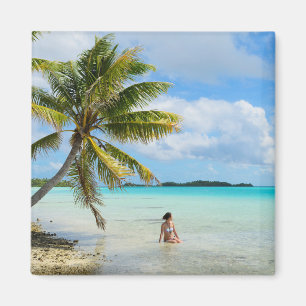 Woman under a palm tree in the Pacific magnet