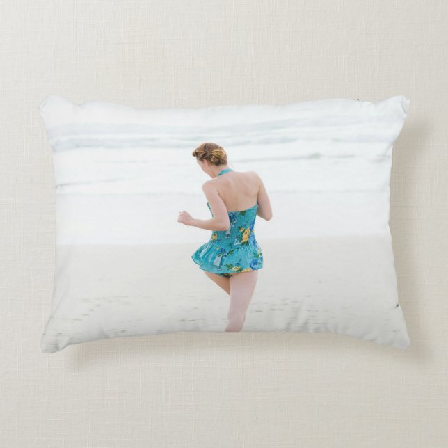 Woman walking on shore near beach decorative cushion (Front)