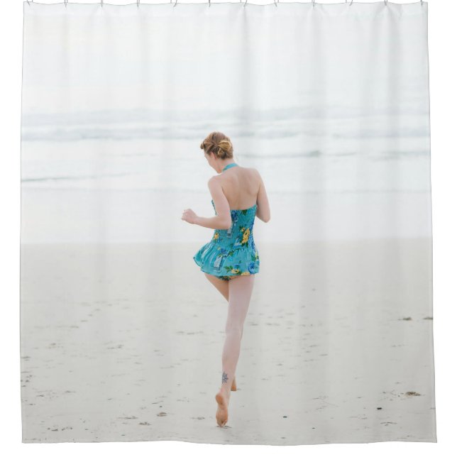 Woman walking on shore near beach shower curtain (Front)