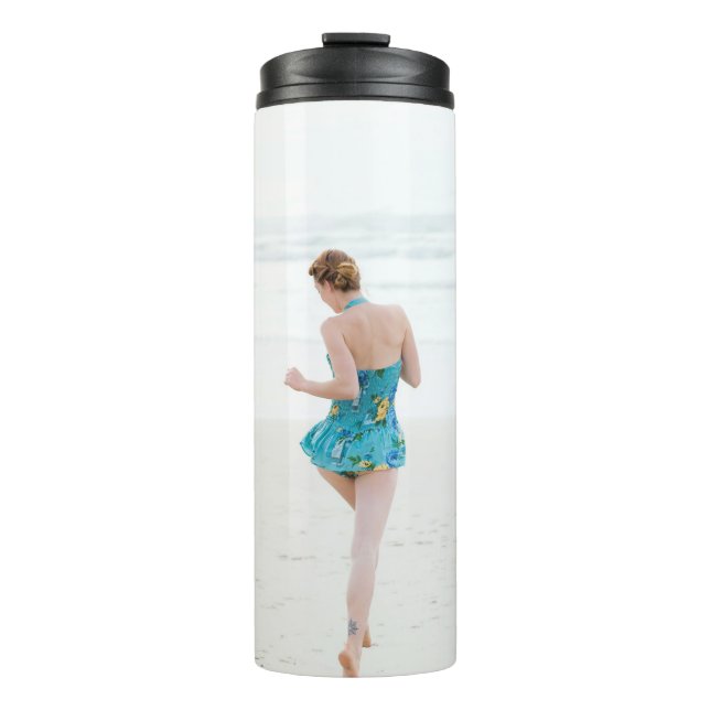 Woman walking on shore near beach thermal tumbler (Front)
