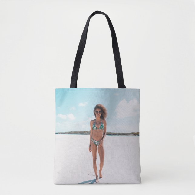 Woman wearing bikini standing on sand tote bag (Front)