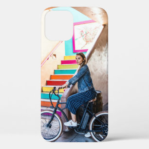 Woman wearing blue denim jacket and shorts riding iPhone 12 case