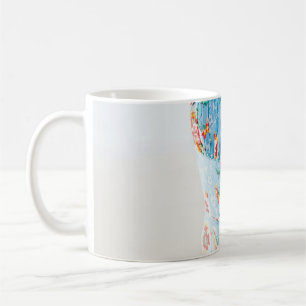 Woman wearing blue floral rompers and brown hat coffee mug