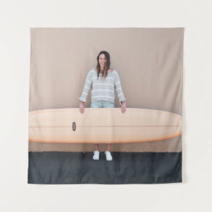 Woman wearing grey and white stripe long-sleeved s tapestry