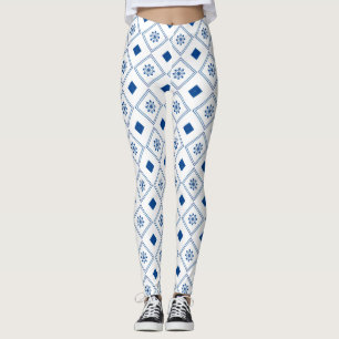 Woman wearing white leggings with blue geometric
