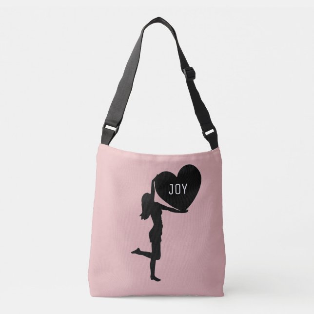 Woman with heart black silhouette on rose gold crossbody bag (Front)