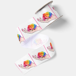Woman's Hand Cradling a Rainbow Rose Satin Ribbon