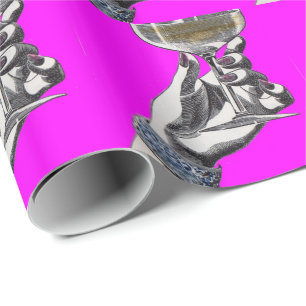 woman's hand holding glass of champagne wrapping paper
