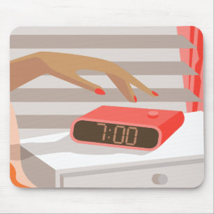 Womans hand pushing on alarm clock snooze button mouse mat