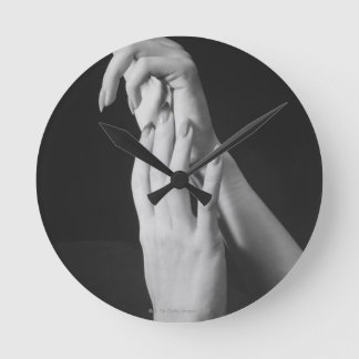 Womans Hands Round Clock
