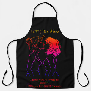 Women enjoying a BBQ together with playful aprons