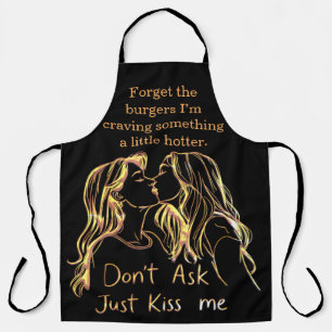 Women enjoying a playful BBQ moment Apron