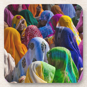Women in colorful saris gather together coaster