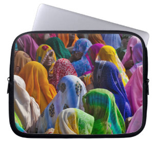 Women in colorful saris gather together laptop sleeve