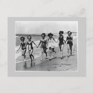 Women run on the beach, 1940s postcard