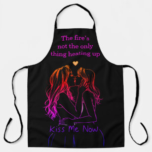 Women sharing a loving moment while wearing aprons