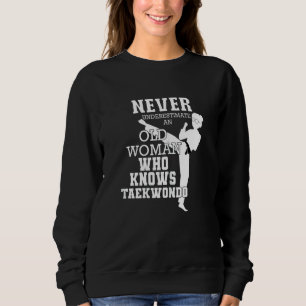 Womens Never Underestimate An Old Woman Who Knows Sweatshirt