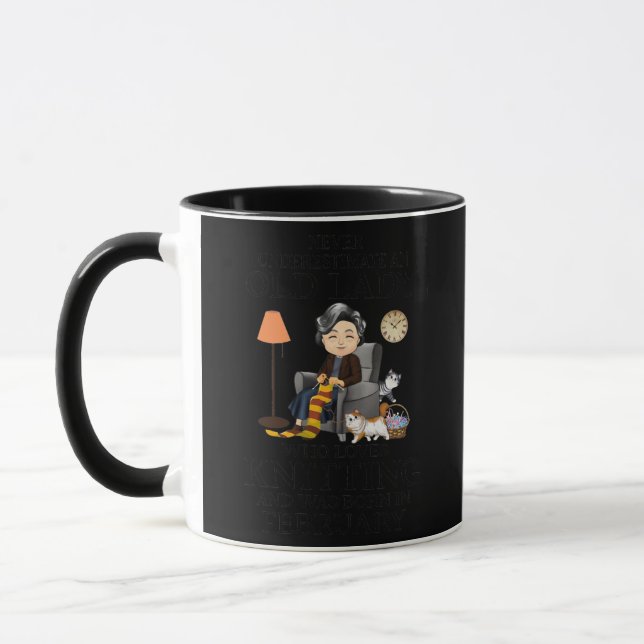 Womens old lady loves knitting born in february mug (Left)