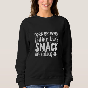 Womens Torn Between Looking Like A Snack And Eatin Sweatshirt