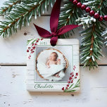 Wood Cranberry Foliage Baby First Christmas Photo Ceramic Ornament<br><div class="desc">A beautiful festive baby's first Christmas ornament. Our design features our beautiful watercolor cranberry festive greenery framing the corners of the ornament. Faux white shiplap wood backgrpound. Customize with your photo,  year,  and name. Design by Moodthology Papery</div>