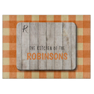 Wood family monogram name orange gingham cutting board