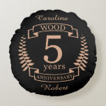 Wood wedding anniversary 5 years round cushion<br><div class="desc">A design to celebrate 5 years of marriage. This design has a tan (wood) coloured laurel design on a black background. Wood is the traditional gift for this occasion. The text reads Wood 5 years anniversary. A romantic design to celebrate your 5th year of marriage. If you would like any...</div>
