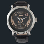 Wood wedding anniversary 5 years watch<br><div class="desc">A design to celebrate 5 years of marriage. This design has a tan (wood) coloured laurel design on a black background. Wood is the traditional gift for this occasion. The text reads Wood 5 years anniversary. A romantic design to celebrate your 5th year of marriage. If you would like any...</div>
